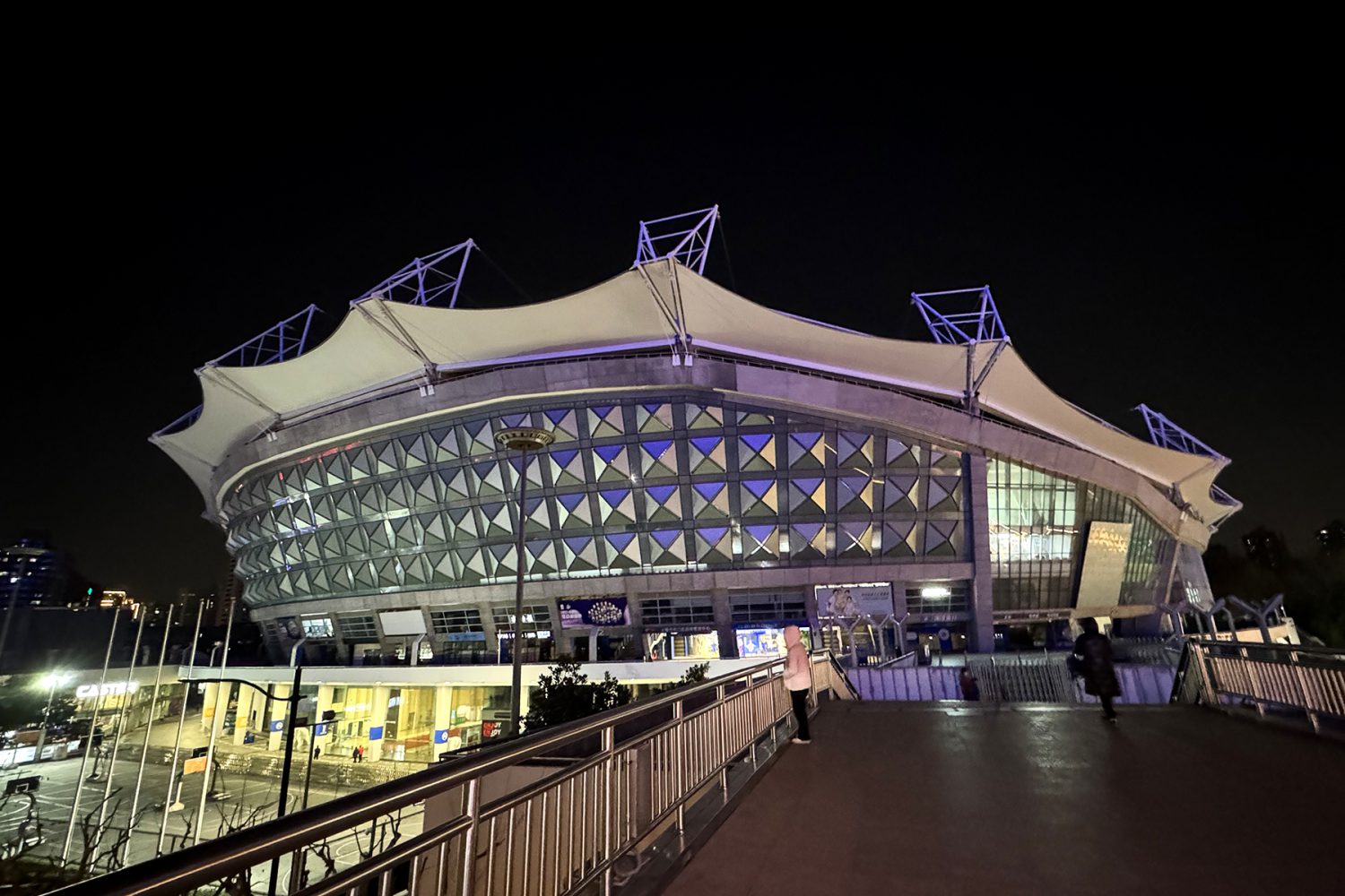 Football stadium under bright lights before an international final